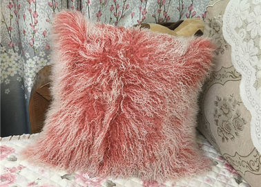 中国 モンゴルの毛皮の枕家の装飾の本物のモンゴルのチベットの羊皮の子ヒツジのウールのピンクの投球枕 サプライヤー
