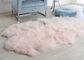 家の床のためのピンクのカーリー ヘアーの特大の羊皮の敷物の快適な反収縮 サプライヤー