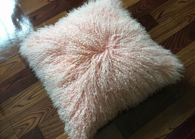 モンゴルの毛皮の枕はピンクの贅沢な本物のチベットのモンゴルの毛皮の投球赤面します